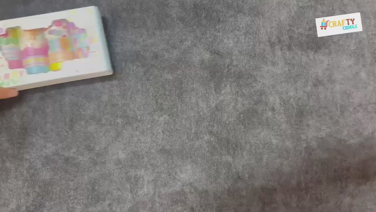 Video showing colorful washi tapes being used for journaling and decoration, with close-up views of patterns and smooth application