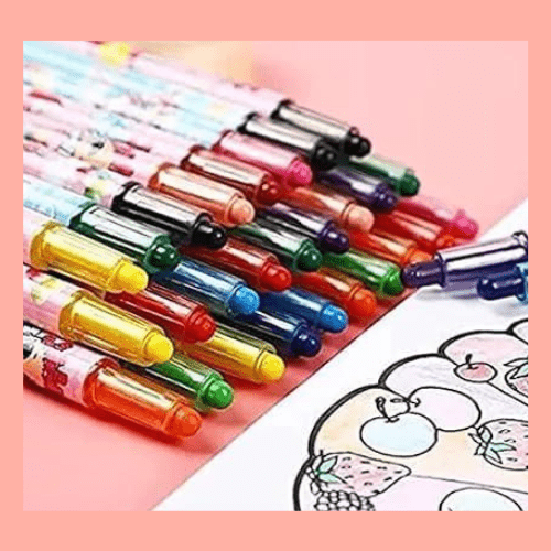 Set of colorful crayons on a pink background with a coloring book page.
