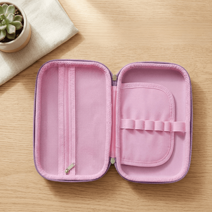 Purple Unicorn EVA Pencil PouchUnicorn EVA pencil pouch boxCrafty CuddlePink travel case with a zipper on a wooden surfacePurple Unicorn Big EVA Pouchbig pencil pouch for kidscute pencil pouch