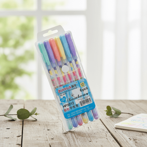 Rainbow Pens Pack of 66 Rainbow PensCrafty CuddlePack of six colorful pens in a clear plastic package on a wooden surface with a blurred natural background.Rainbow pensart suppliesbullet journaling