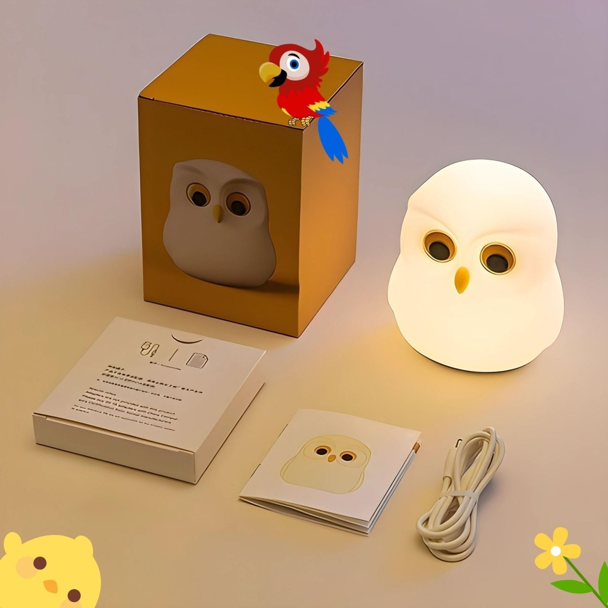 Owl-shaped night light with packaging, instruction manual, and power cord on a neutral background