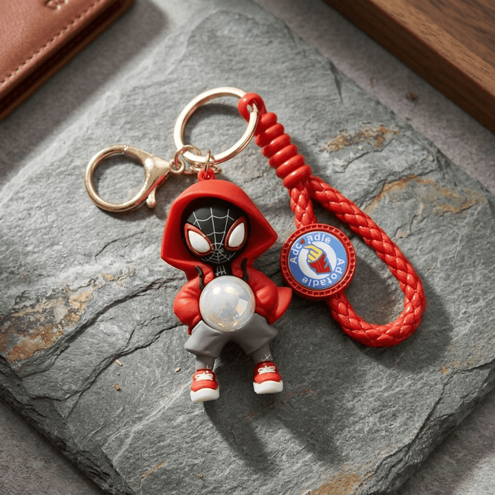 Spider Hero LED Keychain with FlashlightKeychainsCrafty CuddleKeychain with character in red hoodie on a stone surface