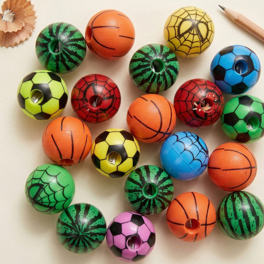 Sporty 3D Ball SharpenerCrafty CuddleColorful pencil sharpeners shaped like sports balls on a light background1