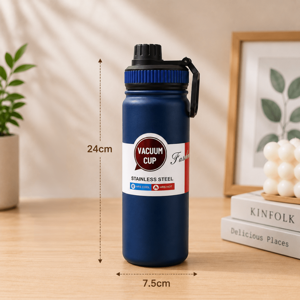 Stainless Steel Vacuum Water Bottle with Carry HandleInsulated Water BottleCrafty CuddleBlue vacuum cup with measurements on a wooden surfaceNavyVacuumBottle WaterBottle InsulatedBottle StainlessSteelBottle HotAndColdBottle TravelBottle GymBottle LeakProofBottle HydrationEssentials ReusableBottle