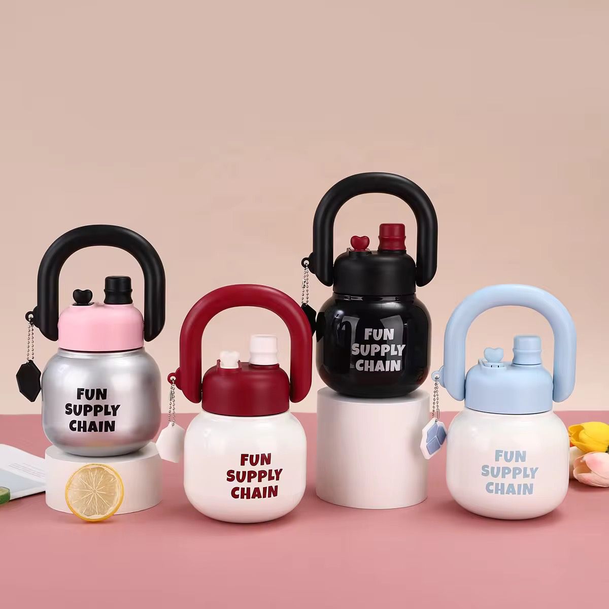Stainless Steel Wide Mouth Water BottleTumblersCRAFTY CUDDLESet of colorful water bottles with 'FUN SUPPLY CHAIN' text on a pink backgroundRedStainlessSteelBottle WideMouthBottle InfuserBottle ReusableStraw TravelWaterBottle GymWaterBottle LeakproofBottle DetoxWaterBottle PortableBottle EcoFriendlyLifestyle