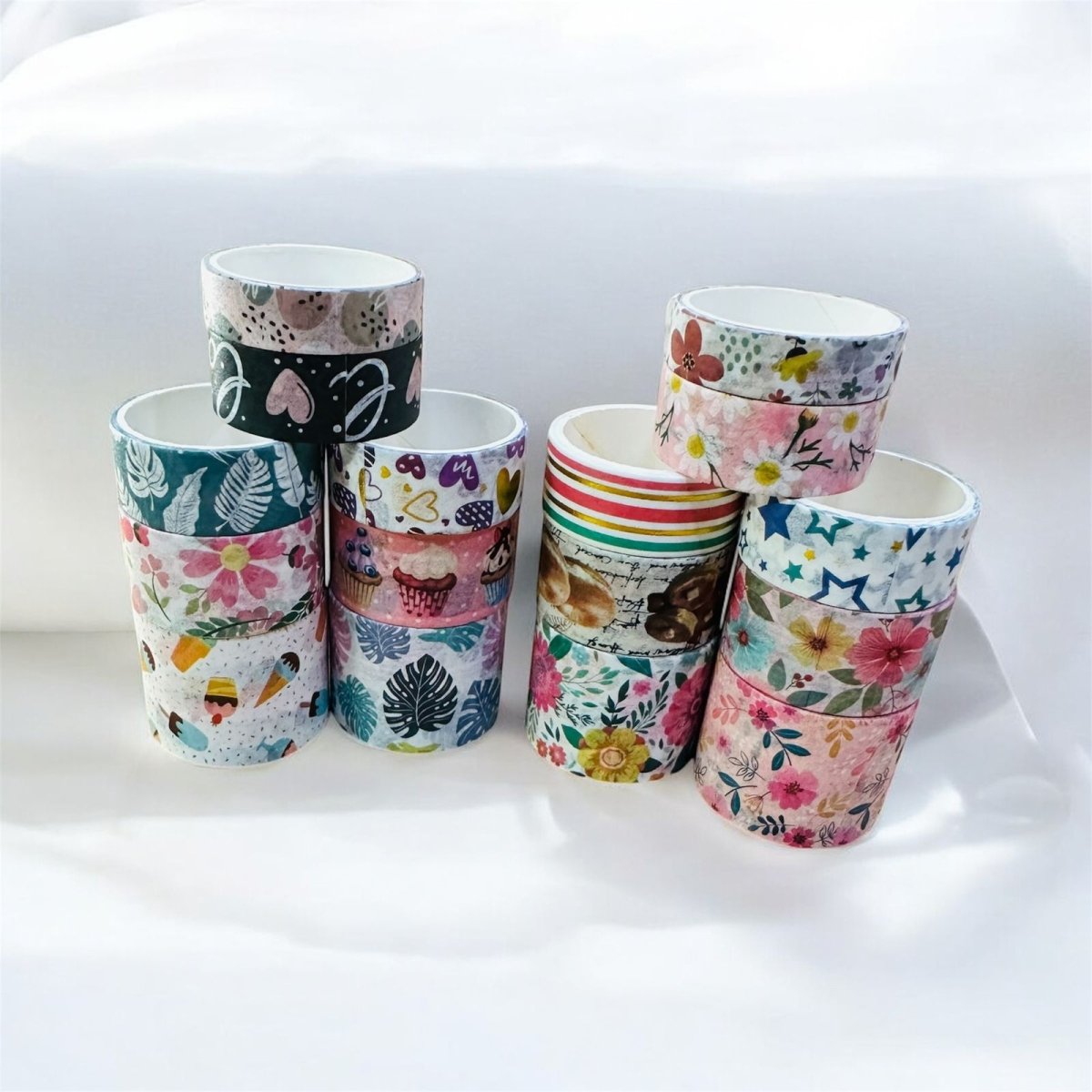 Star Pattern Washi Tape – 50 RollsDecorative Washi TapeCRAFTY CUDDLESet of colorful washi tape rolls stacked on a white surfacewashitape washitapelove washitapecollection papercrafts diycrafts journaling bulletjournal plannerdecor creativejournaling stationerylovers aestheticstationery
