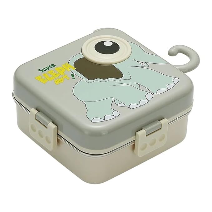 "Gray elephant-themed tiffin box featuring a playful 'Super Elephant' design with a cartoon illustration. Square-shaped with rounded edges and a sturdy handle, placed on a light-colored surface alongside a pink version. Includes an open lunch box with food, a spoon, and decorative accessories—perfect for kids’ meals, school lunches, and reusable food storage solutions.