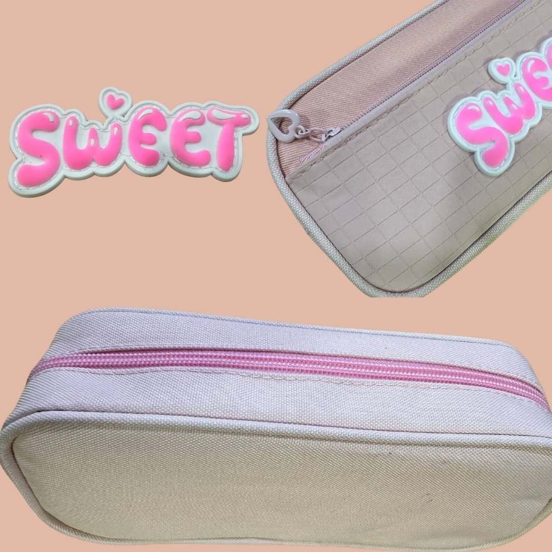 This is the image of a pencil pouch of grey color with a sweet band.