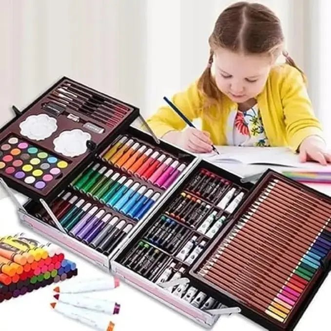 Girl writing in notebook with Unicorn Design Color Set displayed in front