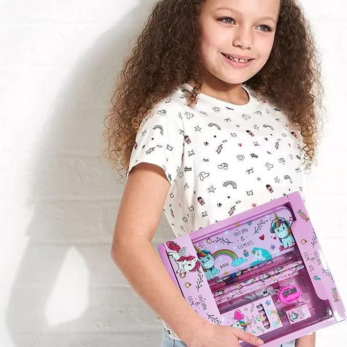 Child holding a pink stationery set with cartoon designs on a white background
