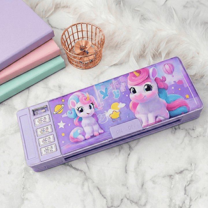 Unicorn-themed pencil case on a marble surface with books and a basket in the background