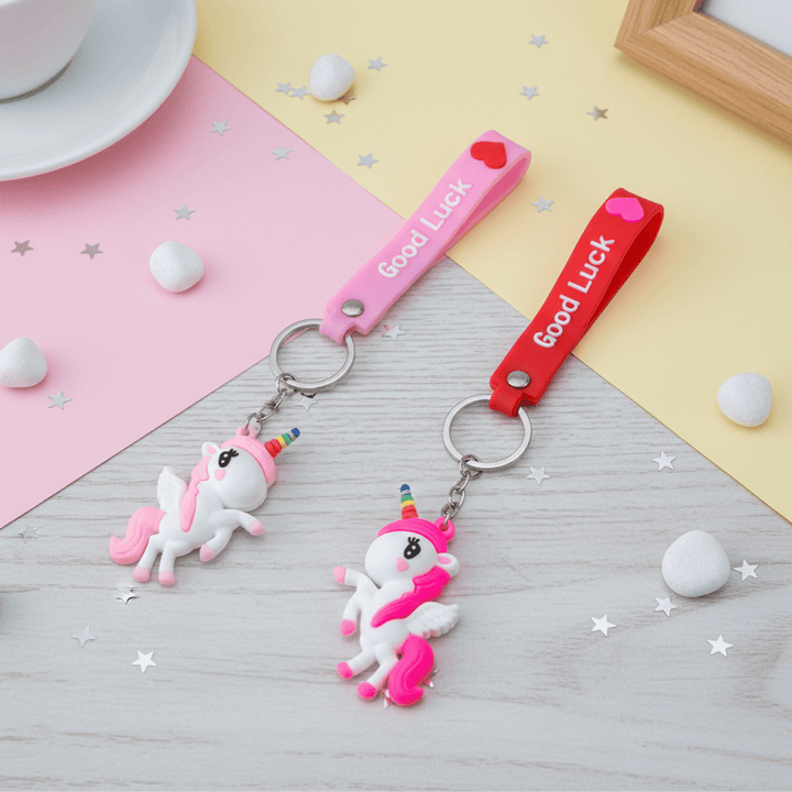 Unicorn Silicone KeychainKeychainsCRAFTY CUDDLETwo keychains with unicorn charms on a colorful background1UnicornKeychain CuteAccessories GirlsAccessories BagCharms UnicornLover ReturnGiftIdeas KidsFashion KawaiiStyle TrendyKeychains GiftForGirls