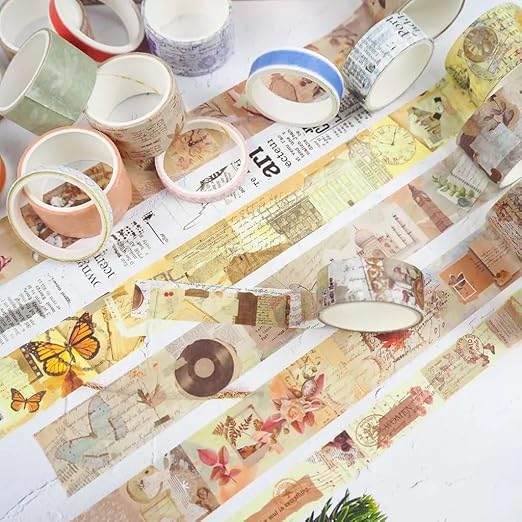 Washi Tape – 20 pcs Vintage Collection SeriesCRAFTY CUDDLECollection of decorative washi tape rolls on a white surface with newspaper underneath.