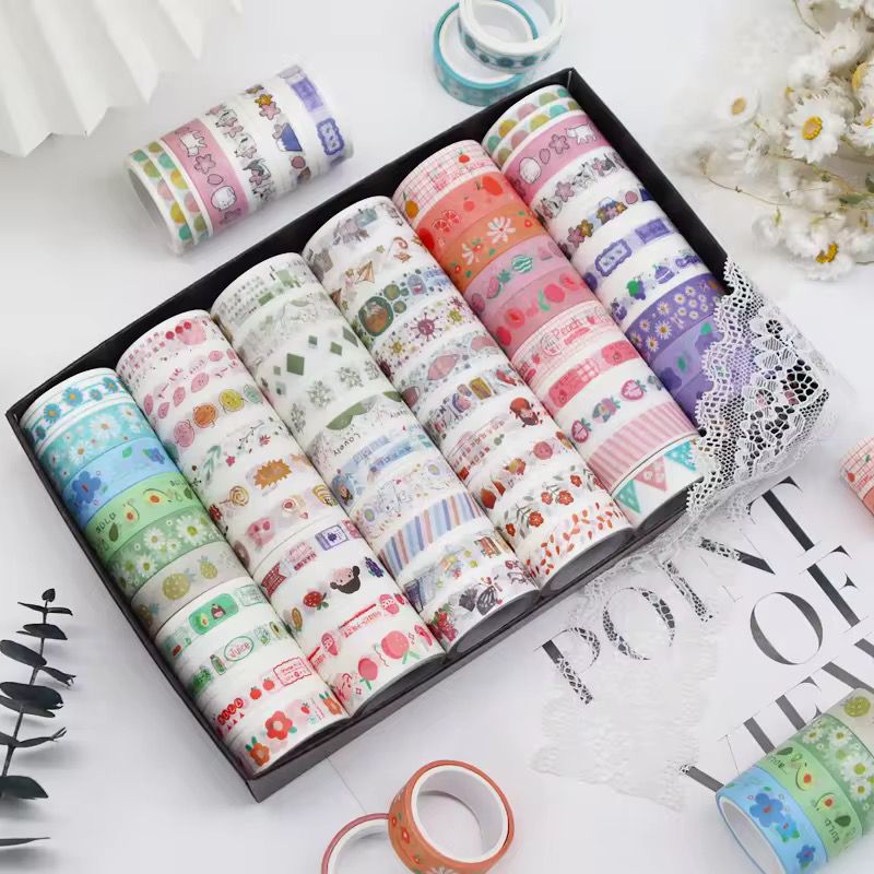 Washi Wonder: Multicolor Magic RollsDecorative Washi TapeCRAFTY CUDDLESet of colorful washi tape rolls in a box on a white surface with decorative elements.10 Rolls Washi Tape10WashiTape WashiTapeAddict StationeryAddict CuteStationery PlannerAddict BulletJournal Scrapbooking DIYCrafts PaperCrafts CreativeJournaling StationeryShop
