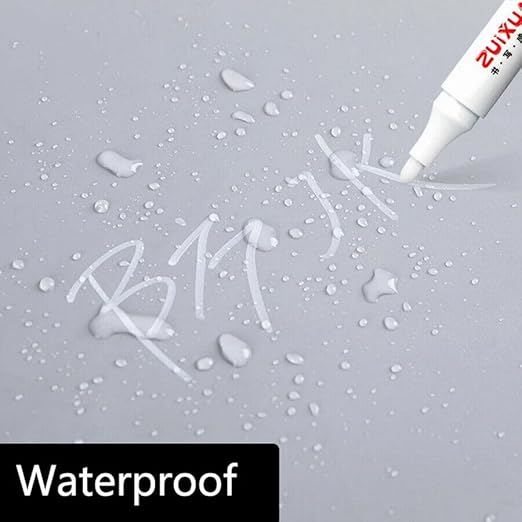 White Permanent Marker Pen Pack of 10Pack of smooth highlightersCrafty CuddleWhite marker writing on a gray surface with water droplets, labeled &